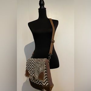 Myra Canvas & Cowhide upcycled crossbody shoulder bag.